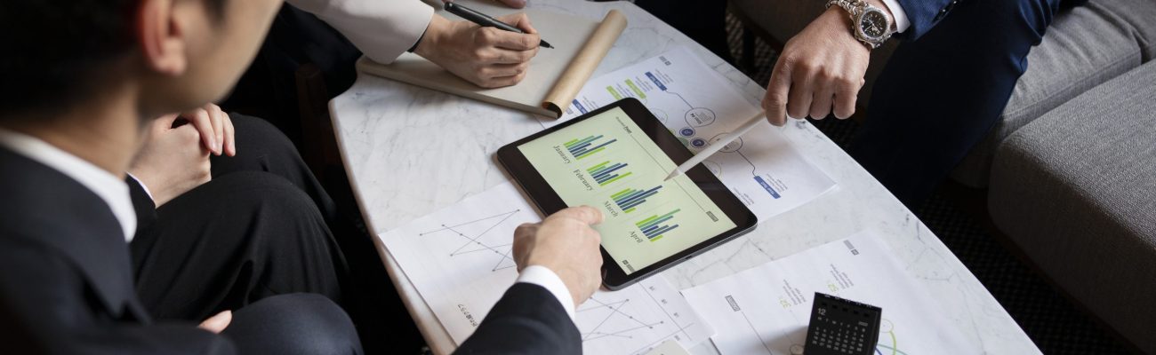 business-people-working-with-ipad-high-angle